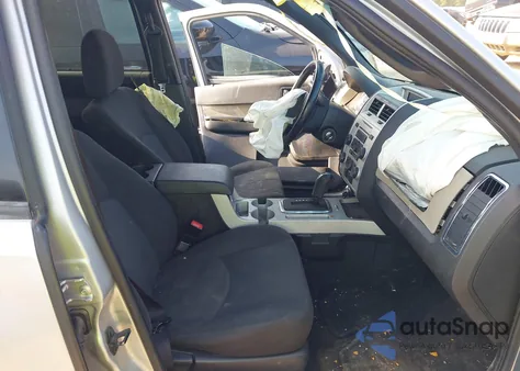 2009 Mercury Mariner I4 from USA, damaged, VIN 4M2CU91769KJ21418